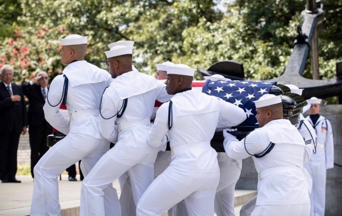 United States Navy ceremonial guard rendering honors
